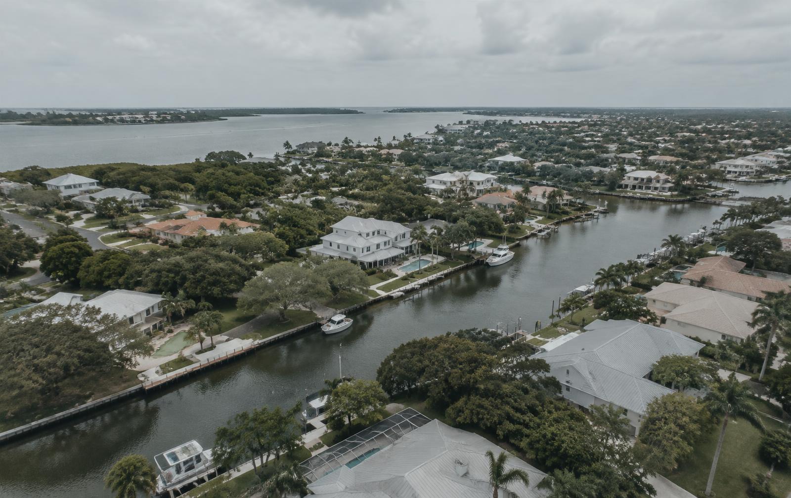 Aerial view of a Florida waterfront residential neighborhood with canals